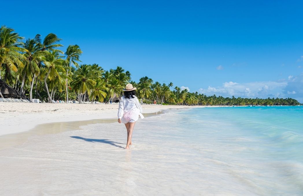 woman-walking-on-a-beach-in-the-dominican-republic-2025-06-15